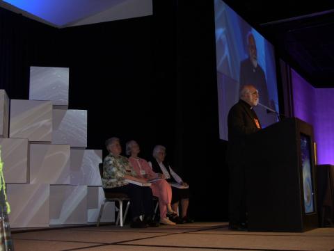 Father Henry Lemoncelli, OMI greets the assembly on behalf of the Vatican