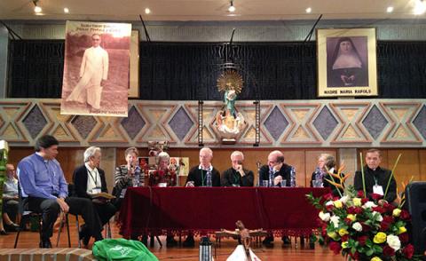 Annmarie Sanders, IHM and Marcia Allen, CSJ (3rd and 4th from left) serve on panel with representatives of other religious conferences outside of Latin America